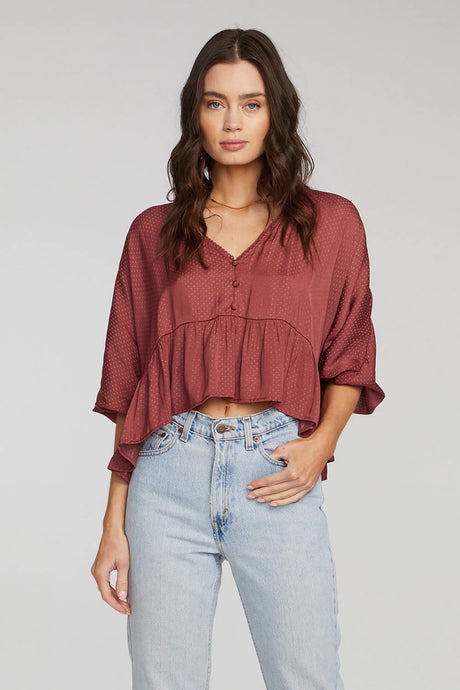 flowy wine coloured top with 3 quarter length elasticized sleaves