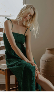 strappy green dress in a crinkle fabric