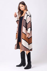 long sweater jacket in brown tones and stripes