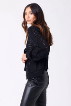 black mesh sweater with three buttons